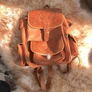 Hand Tooled Vintage leather backpack/Purse